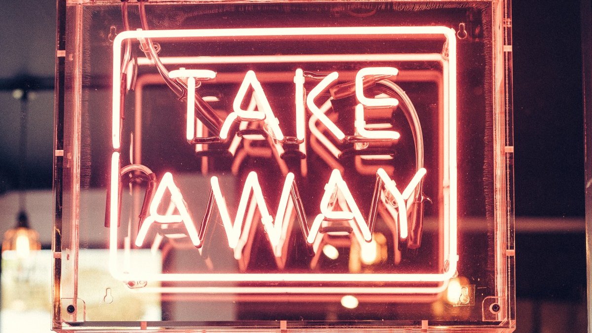 Neon sign with the words Take Away