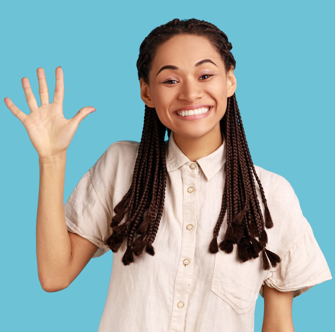 Girl holding up five fingers